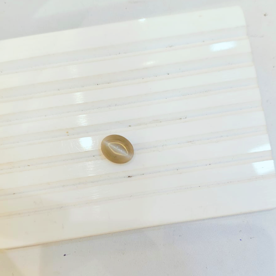 Darshani product editing template (1) Natural Cat’s Eye Stone – 1.27g & 6.98 Ratti