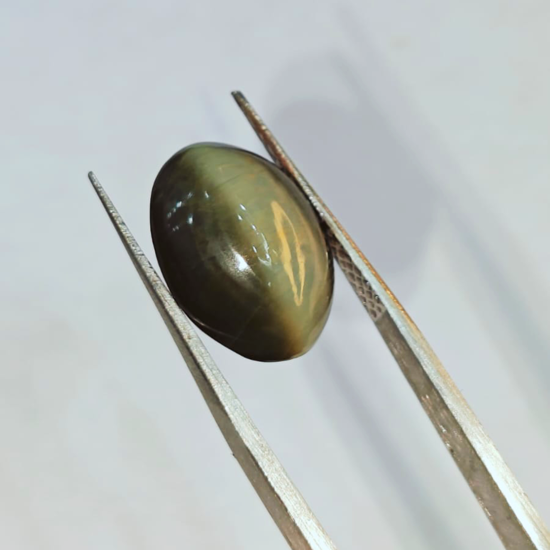 Darshani product editing template (35) Natural Cat’s Eye Stone – 1.35g & 7.42 Ratti