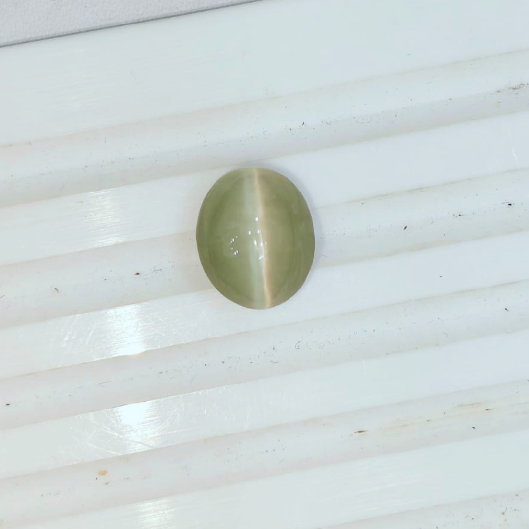 Darshani product editing template (39) Cat’s Eye Stone – 1.56g & 8.58 Ratti